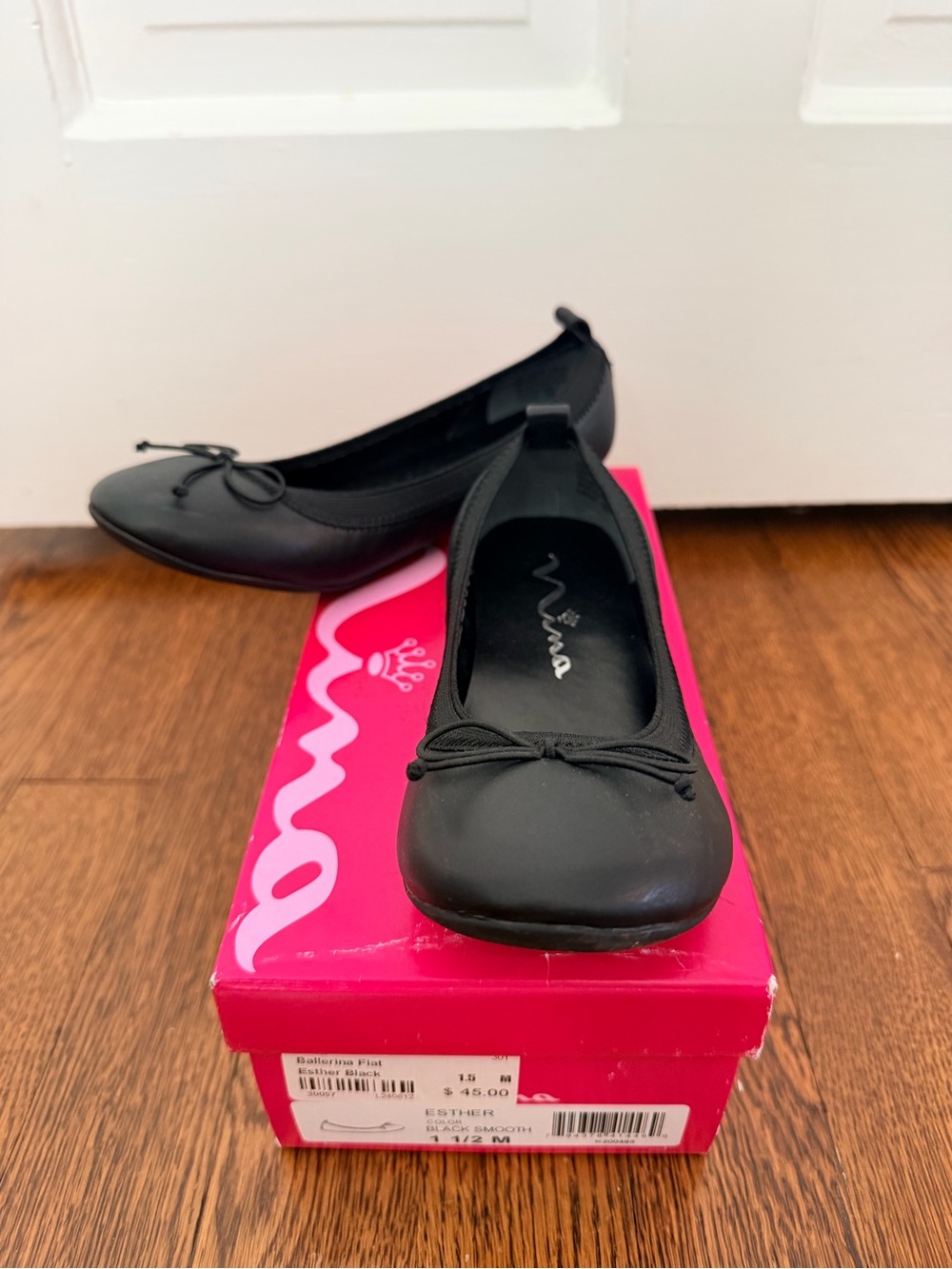 Nina Black Leather Ballet Flats with Elastic For Comfort and Bow Detail